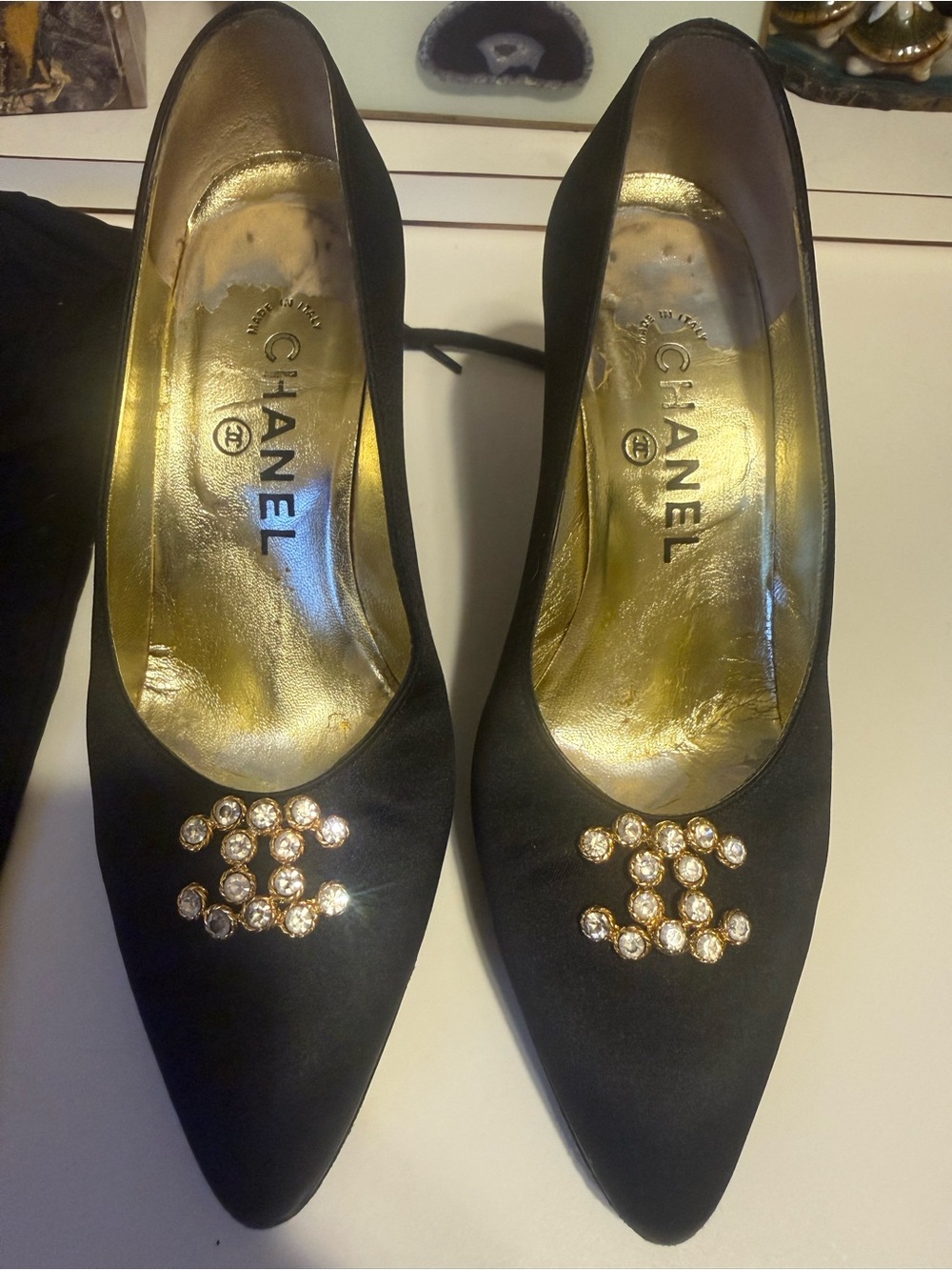 CHANEL Black Satin Pointed-Toe Pumps with Crystal CC Motif